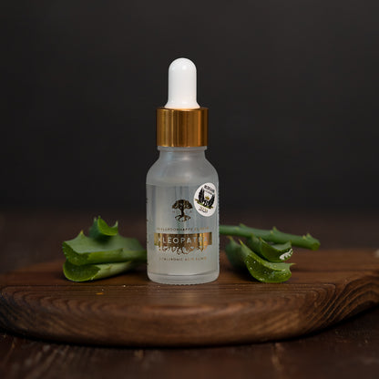 Hyaluronic Acid Elixir Kleopatra an award-winner natural cosmetic product by HOIA on a wooden table