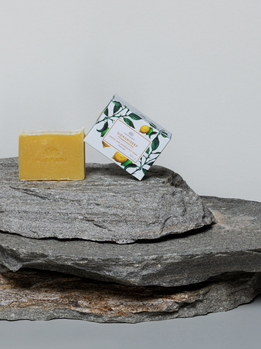 Lemon And Mint Handmade Soap by Magrada Natural Cosmetics on a rock